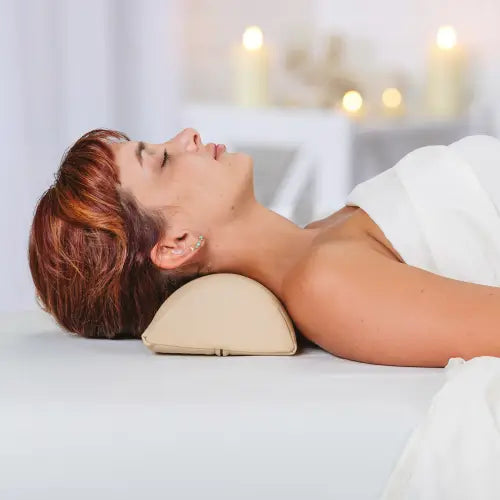 An assortment of professional salon bolster cushions including neck, lumbar, contour, and massage support pillows.