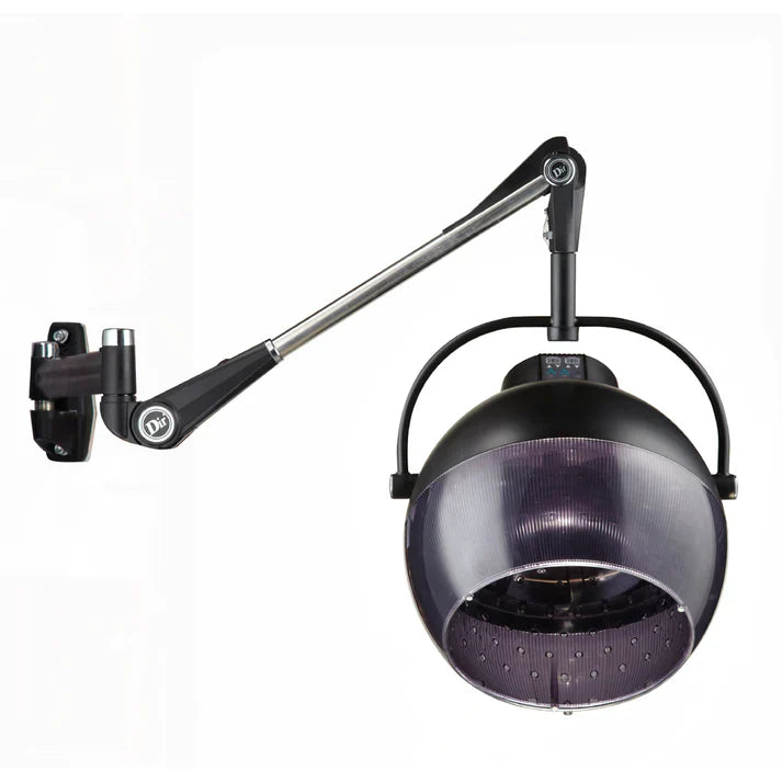 A professional hooded salon hair dryer unit mounted behind a matching plush black vinyl dryer chair, next to a sleek reclining shampoo chair.