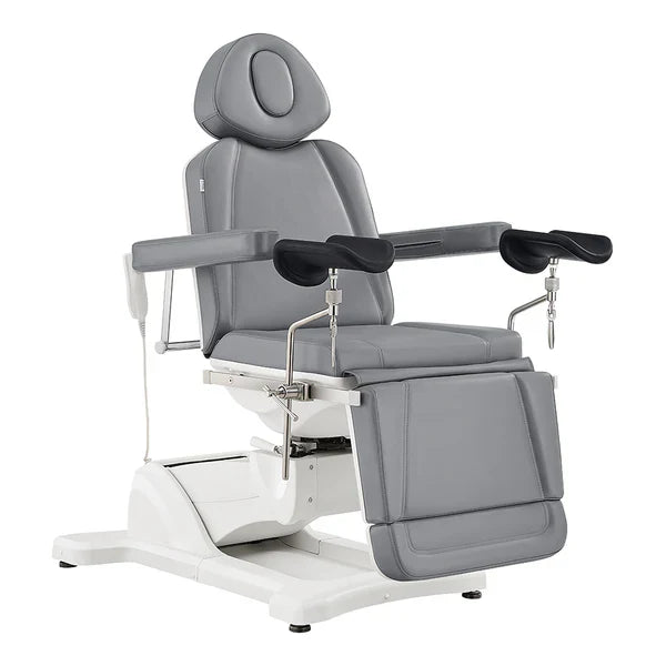 High-end professional medical spa setup featuring an adjustable esthetician treatment table and advanced skin care machines.