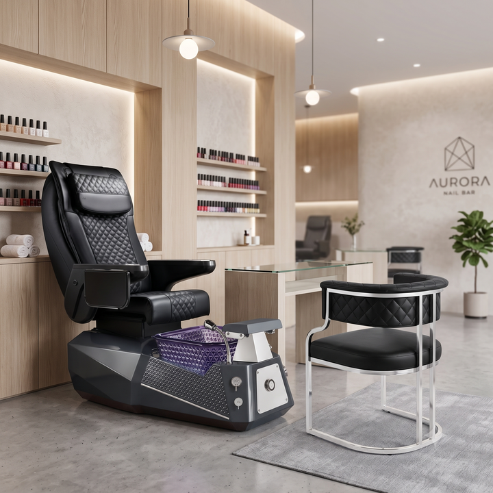 Premium black leather pedicure chair with metallic grey base, glass foot basin, and matching chrome technician chair.
