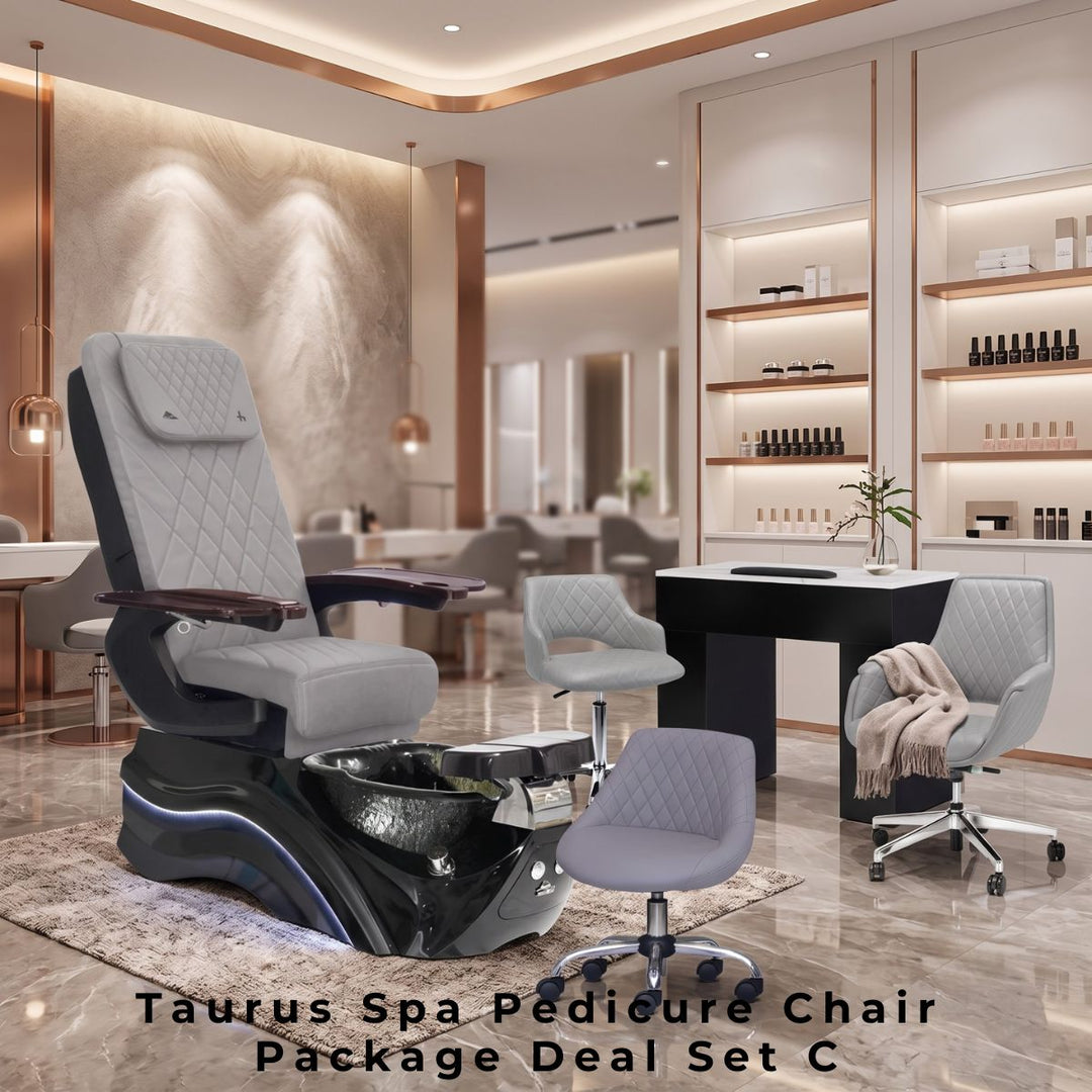 Taurus Spa Pedicure Chair Package Deal Set C. Features a luxury light grey quilted leather spa pedicure chair with a sleek black illuminating foot basin, a black manicure table with a white top, and matching light grey rolling technician chairs in a bright, modern nail salon.