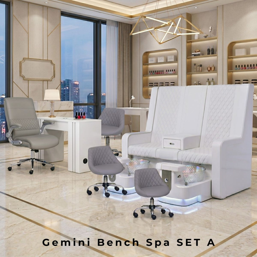 Gemini Bench Spa SET A featuring a white double pedicure bench with glass bowls, matching nail table, luxury gray tech stools, and a plush manicurist chair in a modern salon.