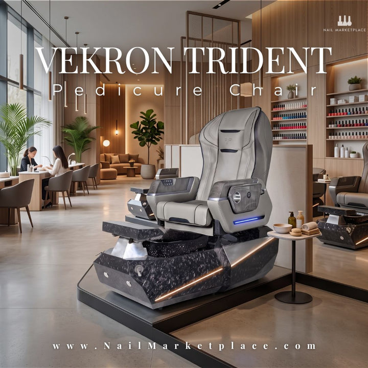 The Vekron Trident Pedicure Chair in a luxurious, modern nail salon, featuring a premium grey massage seat and a dark marbled LED base