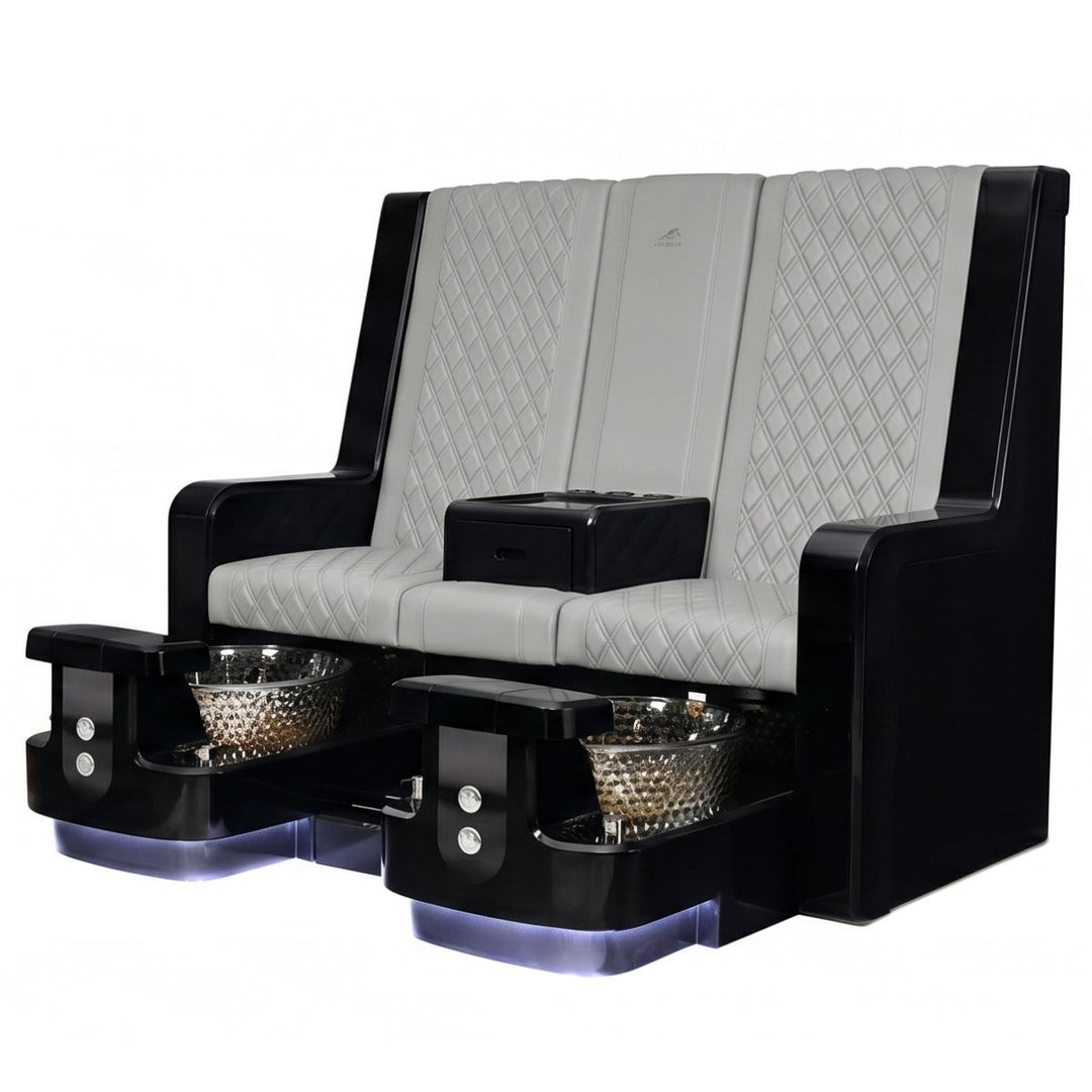 Pedicure chair with black and gray design on a white background