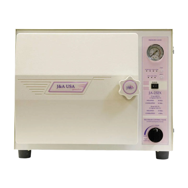 A sleek professional XpressClave autoclave steam sterilizer machine open to show the stainless steel chamber and implement tray.