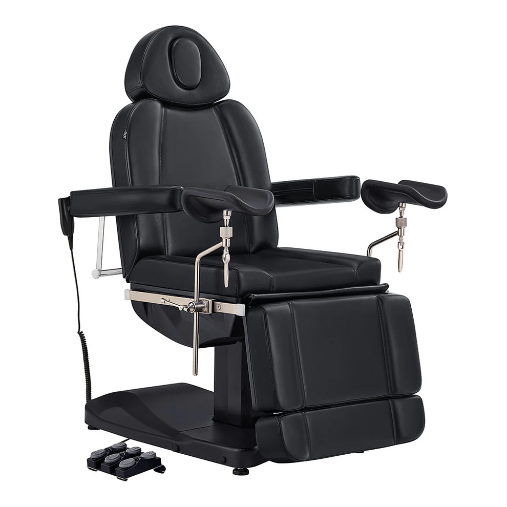High-end black electric salon and medical exam chair with adjustable arm supports and automatic foot remote.
