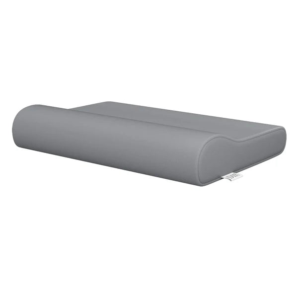 DIR contoured orthopedic cervical support pillow in gray vinyl upholstery for wellness clinics.